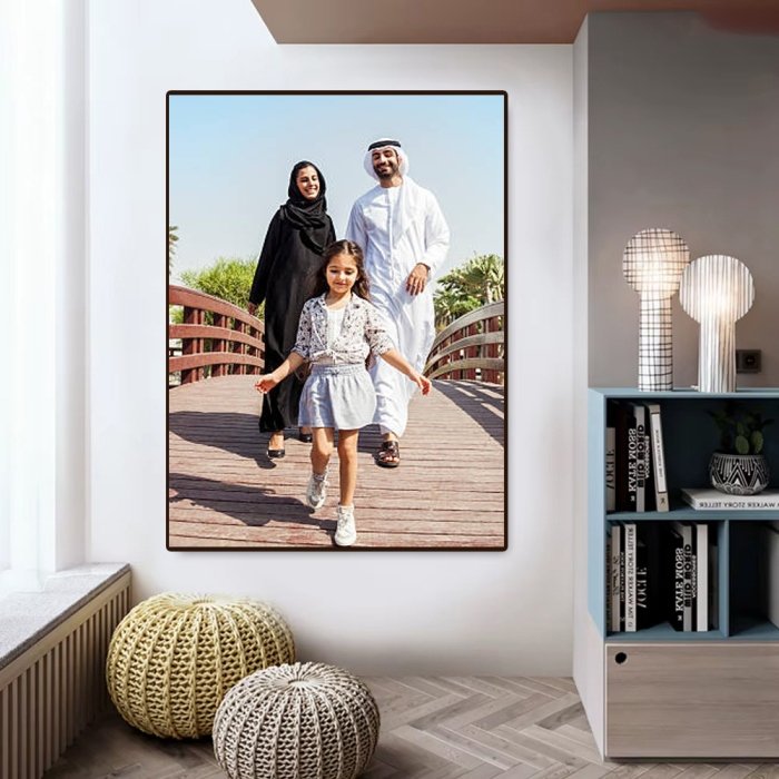 A modern family photo print framed and displayed on an interior wall, showcasing a minimalist design with warm, inviting tones.